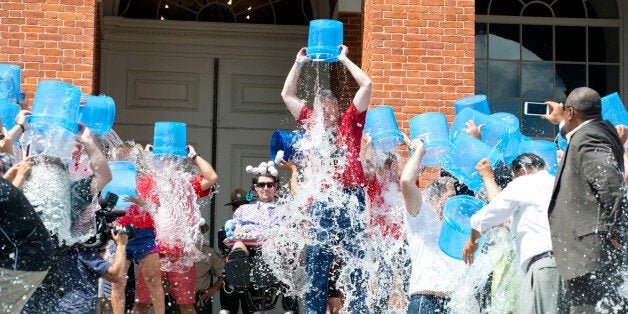 On Monday, August 10th, Governor Charlie Baker and Lt. Governor Karyn Polito took part in the ALS âEvery August Until a Cureâ Ice Bucket Challenge at the State House. Co-founder Pete Frates and his family participated alongside the Governor, Lt. Governor, Senate President Rosenberg, Treasurer Goldberg, Auditor Bump, and members of the administration.(Photo Credit: Joanne DeCaro)