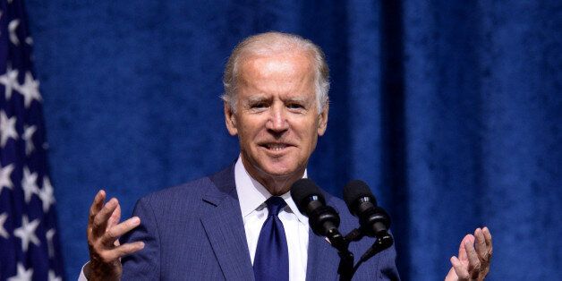 CHATTANOOGA, TN - AUGUST 15: U.S. Vice President Joe Biden speaks at a memorial service to honor those killed In Chattanooga shooting at University of Tennessee at Chattanooga's McKenzie Arena on August 15, 2015 in Chattanooga, Tennessee. The military is putting on the ceremony to honor the sailor and four Marines killed and to say thank you to the men and women who helped responded when Mohammad Abdulazeez shot up a military recruitment center and a Navy operations support center before being killed by law enforcement, (Photo by Jason Davis/Getty Images)