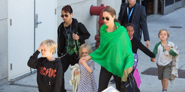 LOS ANGELES, CA - FEBRUARY 05: Angelina Jolie is seen after landing at Los Angeles International Airport with her children, Maddox Jolie-Pitt, Shiloh Jolie-Pitt, Vivienne Jolie-Pitt, Zahara Jolie-Pitt and Knox Jolie-Pitt on February 05, 2014 in Los Angeles, California. (Photo by GVK/Bauer-Griffin/GC Images)