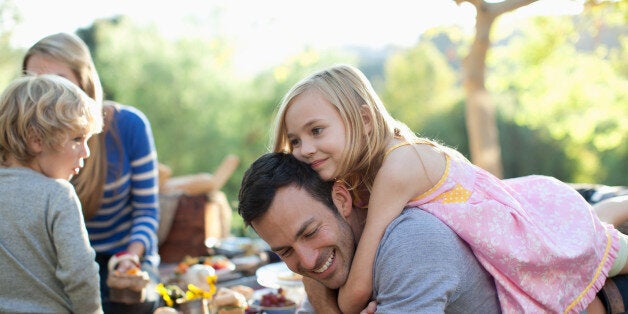 Family picnicking together outdoors