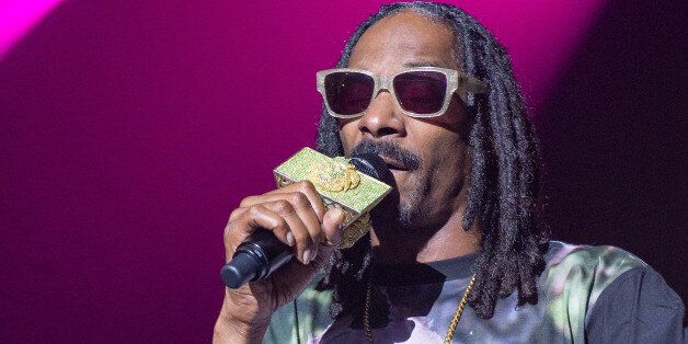 WESTBURY, NY - JULY 08: Snoop Dogg performs in concert at The Space at Westbury on July 8, 2014 in Westbury, New York. (Photo by Mike Pont/Getty Images)