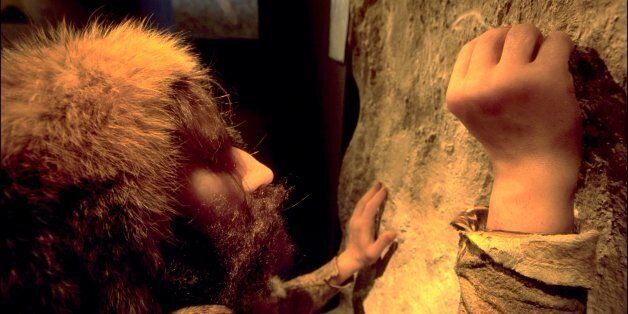 FRANCE - MAY 29: Prehistorical museum in Quinson, France on May 29, 2001 - Paleolithic period (80,000 BC), a scene showing a Neanderthal man engraving a rock wall using a silex-made chisel. (Photo by Xavier ROSSI/Gamma-Rapho via Getty Images)