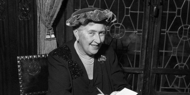 circa 1965: British mystery author Agatha Christie (1890-1976) autographing French editions of her books. (Photo by Hulton Archive/Getty Images)