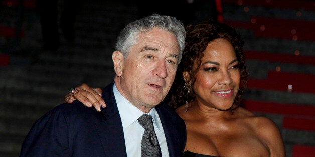 Robert De Niro, left, and Grace Hightower, right, attend the annual Vanity Fair Tribeca Film Festival kick-off party at the State Supreme Courthouse on Tuesday, April 14, 2015, in New York. (Photo by Andy Kropa/Invision/AP)