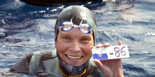 Russian Natalia Molchanova shows the minus 86 metres tag that gives her a win in the first women's free-diving world championship 03 September 2005 in Villefranche-sur-Mer. Molchanova retained her world champion status. AFP PHOTO JACQUES MUNCH (Photo credit should read JACQUES MUNCH/AFP/Getty Images)