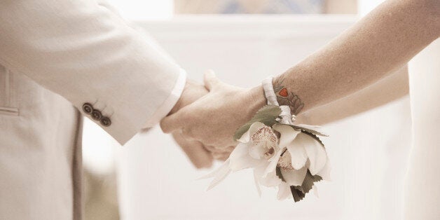 wedding couple holding hands