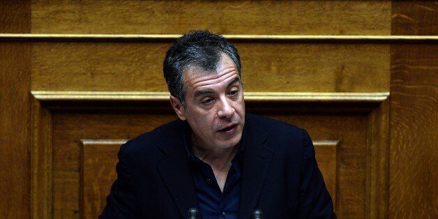 The leader of the Potami party, Stavros Theodorakis, speaks on February 10, 2015 during a parliament session ahead of the confidence vote of the new government. Greece's new leftist government fine-tuned a 10-point plan aimed at persuading its international creditors to reluctantly rethink their bailout terms and prevent the country from going bust. AFP PHOTO / LOUISA GOULIAMAKI (Photo credit should read LOUISA GOULIAMAKI/AFP/Getty Images)