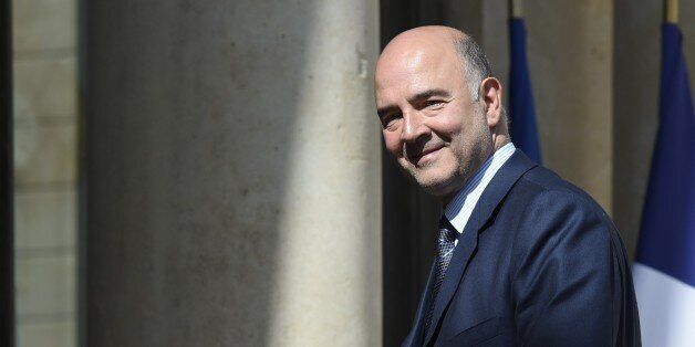 EU Economic Affairs Commissioner Pierre Moscovici arrives for a meeting on the Juncker plan, aimed at boosting investment in Europe, on July 29, 2015 at the Elysee palace in Paris. AFP PHOTO / ALAIN JOCARD (Photo credit should read ALAIN JOCARD/AFP/Getty Images)