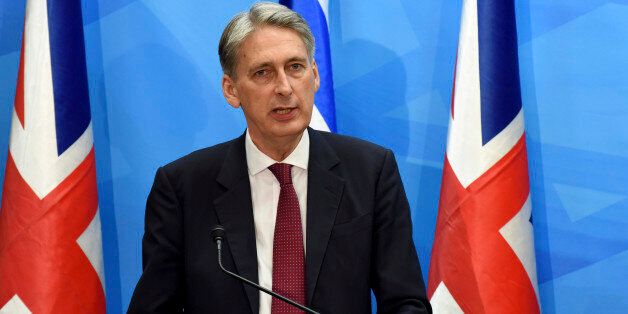 British Foreign Secretary Philip Hammond holds a joint press conference with Israeli Prime Minister Benjamin Netanyahu in the prime minister's office in Jerusalem on Thursday, July 16, 2015. Netanyahu and Hammond sparred publicly Thursday over the international nuclear deal with Iran, veering off prepared comments to exchange sharply different positions toward the agreement. (Debbie Hill, Pool Photo via AP)