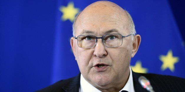 French Finance Minister Michel Sapin is pictured during a press conference following a meeting with bank representatives on July 28, 2015 in Paris. AFP PHOTO / MIGUEL MEDINA (Photo credit should read MIGUEL MEDINA/AFP/Getty Images)