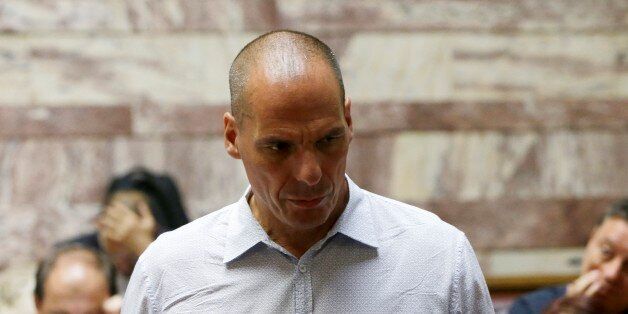 Parliament Member Yanis Varoufakis arrives for a meeting with lawmakers of Syriza governing party at the Greek Parliament in Athens, Wednesday, July 15, 2015. Greece's Prime Ministers Alexis Tsipras faced a rising wave of hostility from members of his own party Wednesday ahead of a parliament vote on an austerity bill that condemns the country to years of spending cuts but is required to get a new bailout package. (AP Photo/Petros Karadjias)
