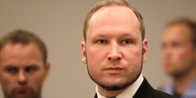 Anders Behring Breivik listens to the judge in the courtroom, Friday, Aug. 24, 2012, in Oslo, Norway. A chapter of a terror case that has haunted Norway for 13 months ended Friday as confessed mass killer Anders Behring Breivik was declared sane and sent to prison for bomb and gun attacks that killed 77 people and injured 200 others last year. After deliberating for two months, a five-judge panel in Oslo's district court handed down a sentence of