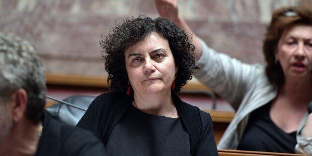 Greece's deputy finance minister Nadia Valavani attends Syriza's parliamentary group at the greek parlament in Athens on July 15, 2015. Valavani resigned on July 15, as parliament readied to vote on unpopular reforms needed to unlock a huge bailout from eurozone creditors. AFP PHOTO/ LOUISA GOULIAMAKI (Photo credit should read LOUISA GOULIAMAKI/AFP/Getty Images)