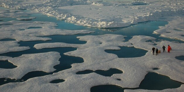 Scientists in an endless vista of ice, sea, and meltwater as seen from the USCG Icebreaker HEALY. Arctic Ocean, Canada Basin. July 22, 2005.Photographer: Jeremy Potter NOAA/OAR/OER.