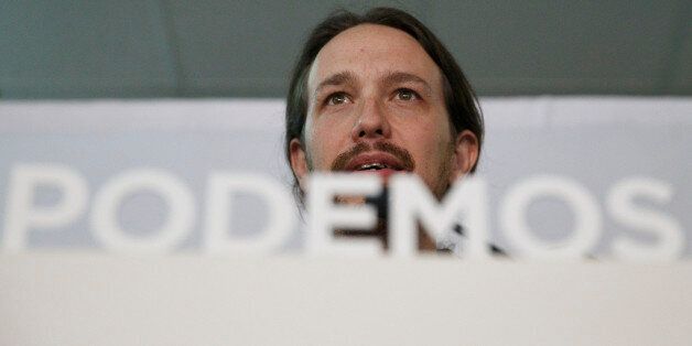 Pablo Iglesias, leader of the Podemos (We Can) party gives a speech to celebrate the party results after the elections and in support of local candidate for Ahora Madrid (Madrid Now) party in Madrid, Spain, Sunday, May 24, 2015. Ahora Madrid stood for the Madrid municipal elections to seek an end nearly four decades of dominance by the conservative Popular Party and the center-left Socialists.(AP Photo/Daniel Ochoa de Olza)