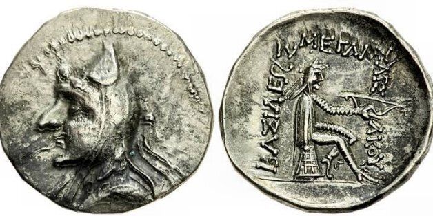 Silver Drachma of Parthian king Mithradates I. Obverse: King wearing the typical iranian "Bashlick" hat. Reverse: Arsakes Ist, faunder or the arsacid parthian dynasty, seating on a an omphalos and holding a bow, greek legend saying "Basileus Mega Arsakou"," the great king arsakes (archer)". Mint is Hecatompylos (means the "100 gates", ancien Parthian capital aka Thebes, Egypt). 171-135 BCE.Personal collection image not taken by me (mine are less good), June 2011
