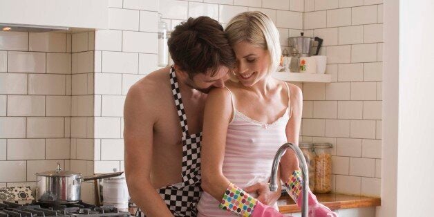 Affectionate couple in kitchen