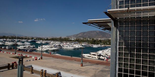 In this photo taken on Thursday, July 16, 2015, yachts docked at the marina of Agios Kosmas used for sailing events during Athens' 2004 Olympic games. Now, in a bid to get a third European bailout, the ruling party has done an about face and is pledging to fast-track the waterfront project plus a host of other privatization efforts aimed at generating cash to help to reduce Greeceâs 320 billion euros national debt.(AP Photo/Petros Giannakouris)