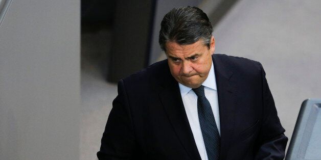 German Vice Chancellor and Economy Minister Sigmar Gabriel leaves after his speech during a debate on the Greek financial crisis at the German parliament. the Bundestag , in Berlin, Wednesday, July 1, 2015. (AP Photo/Markus Schreiber)