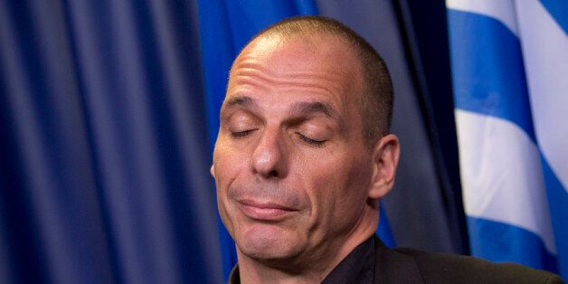 Greek Finance Minister Yanis Varoufakis answers questions during a media conference after a meeting of eurogroup finance ministers in Brussels on Saturday, June 27, 2015. Anxiety over Greece's future swelled on Saturday after Prime Minister Alexis Tsipras' call to have the people vote on a proposed bailout deal. (AP Photo/Virginia Mayo)