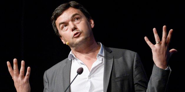FILE - In this June 30, 2014 file photo, French economist Thomas Piketty speaks during his seminar at the Almedalen political week in Visby on the island of Gotland, in Sweden. Novelist Marilynne Robinson, economist Piketty and cartoonist Roz Chast are among the finalists for National Book Critics Circle prizes. The 30 nominees for six competitive categories were announced Monday, Jan. 19, 2015. (AP Photo/Janerik Henriksson, File) SWEDEN OUT