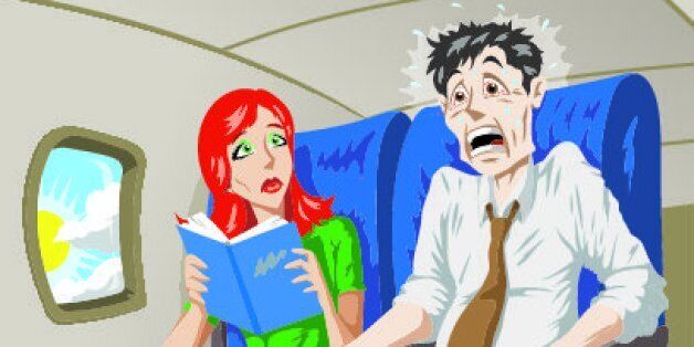 Man on a plane terrified of flying
