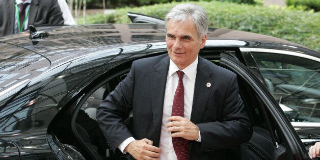 Austrian Chancellor Werner Faymann arrives for an emergency summit of eurozone heads of state or government at the EU Council building in Brussels on Tuesday, July 7, 2015. Greek Prime Minister Alexis Tsipras strode into a summit of eurozone leaders with a beaming smile Tuesday, but was met with anger, dejection and frustration after it became clear he had no written proposals on how to save his country from financial ruin. (AP Photo/Francois Walschaerts)