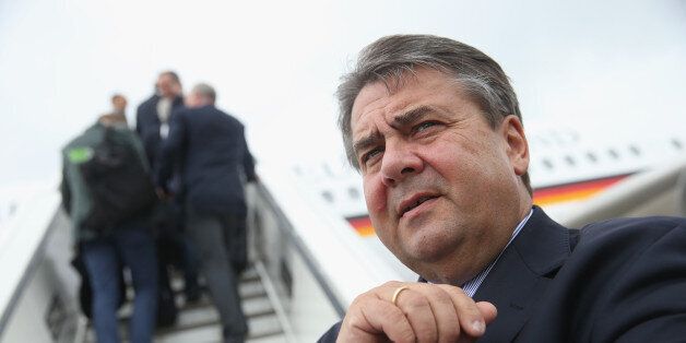 BERLIN, GERMANY - JULY 13: German Vice Chancellor and Economy and Energy Minister Sigmar Gabriel prepares to board a German delegation flight to China after Eurozone and Greek government representatives agreed on a new financial aid package for debt-stricken Greece earlier in the day on July 13, 2015 in Berlin, Germany. Gabriel is also chairman of the German Social Democrats (SPD), the junior coalition partner in the current German government, and the SPD will have to approve the latest aid pac