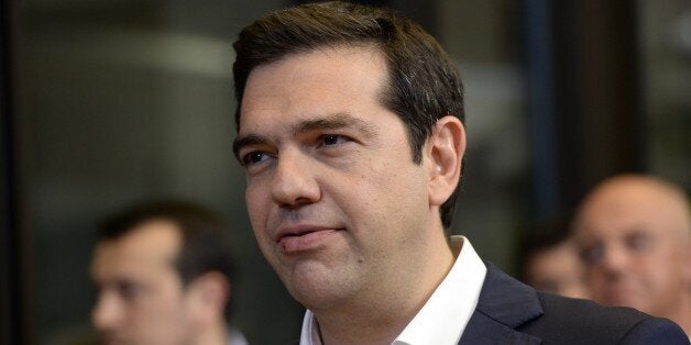 Greek Prime Minister Alexis Tsipras talks to the media at the end of a Special EU Summit on the Greek crisis at the EU Council building in Brussels, July 07, 2015. European leaders gave debt-stricken Greece a final deadline of July 12 to reach a new bailout deal and avoid crashing out of the euro, after Greek voters rejected international creditors' plans in a weekend referendum. AFP PHOTO/THIERRY CHARLIER (Photo credit should read THIERRY CHARLIER/AFP/Getty Images)