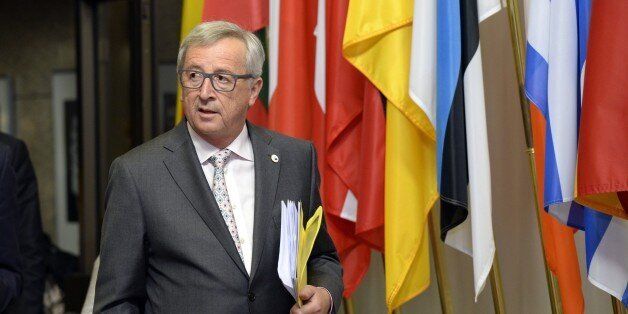 European Union Commission President Jean-Claude Juncker leaving at the end of an Eurozone Summit over the Greek debt crisis in Brussels on July 13, 2015. Juncker said there was no longer any risk of Greece crashing out of the euro after Athens agreed a bailout deal with eurozone partners. AFP PHOTO / THIERRY CHARLIER (Photo credit should read THIERRY CHARLIER/AFP/Getty Images)