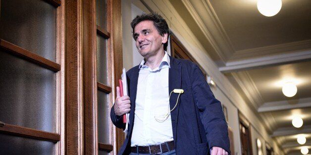 Greek Junior Foreign Minister Euclid Tsakalotos, head of Greece's negotiating team in loan talks, arrives for a cabinet meeting at the Greek parliament in Athens on April 30, 2015. Greece resumed talks with its international creditors on critically-needed bailout funds as officials warned that time was running out for a deal. AFP PHOTO / LOUISA GOULIAMAKI (Photo credit should read LOUISA GOULIAMAKI/AFP/Getty Images)