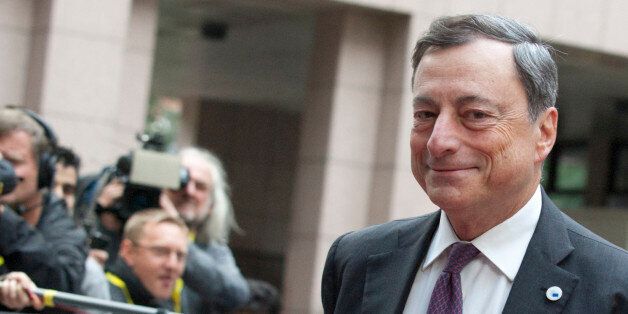 European Central Bank Governor Mario Draghi arrives for a meeting of eurozone heads of state at the EU Council building in Brussels on Sunday, July 12, 2015. Greece has another chance Sunday to convince skeptical European creditors that it can be trusted to enact wide-ranging economic reforms which would safeguard its future in the common euro currency. (AP Photo/Francois Walschaerts)