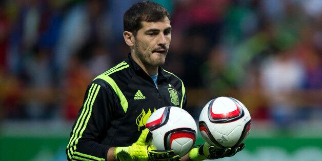 LEON, SPAIN - JUNE 11: Iker Casillas of Spain holds a pair of balls during his warming up prior to start the international friendly match between Spain and Costa Rica at Reino de Leon Stadium on June 11, 2015 in Leon, Spain. (Photo by Gonzalo Arroyo Moreno/Getty Images)