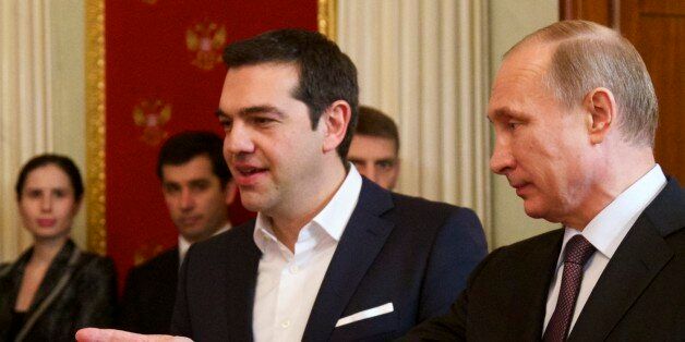 Russian President Vladimir Putin, right, and Greek Prime Minister Alexis Tsipras attend a signing ceremony in the Kremlin in Moscow, Russia, Wednesday, April 8, 2015. Russian President Vladimir Putin said the leader of Greece did not ask for financial aid during an official visit, easing speculation that Athens might use its relations with Moscow to gain advantage in bailout talks with European creditors. (AP Photo/Alexander Zemlianichenko, pool)
