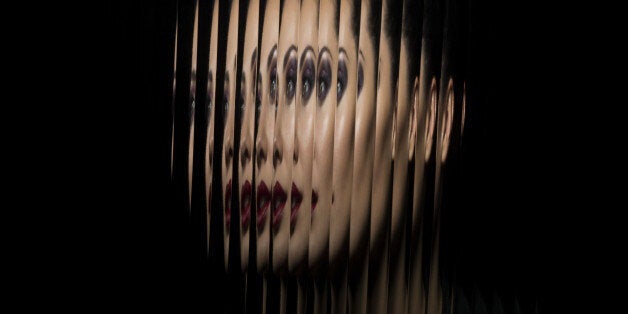 Portrait of female through glass