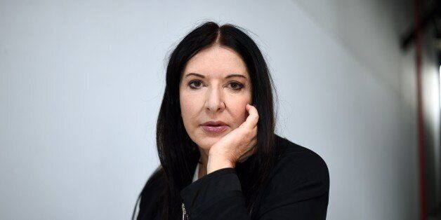 TO GO WITH: Entertainment-Australia-Abramovic-arts, FEATURE by Madeleine CooreyThis picture taken on June 18, 2015 shows performance artist Marina Abramovic posing after an interview in Sydney. The charismatic performance art pioneer now counts pop star Lady Gaga and actor James Franco among her fans, while her performances attract people in the thousands. AFP PHOTO / Saeed KHAN RESTRICTED TO EDITORIAL USE, MANDATORY MENTION OF THE ARTIST UPON PUBLICATION, TO ILLUSTRATE THE EVENT AS SPECIFIED IN THE CAPTION (Photo credit should read SAEED KHAN/AFP/Getty Images)