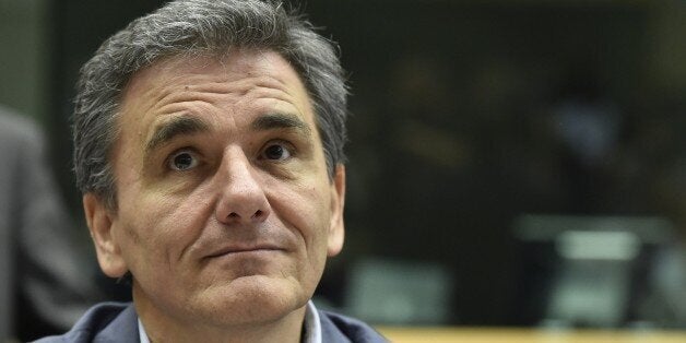 Newly appointed Greek Finance Minister Euclid Tsakalotos looks on during a Eurogroup meeting ahead of a Eurozone Summit meeting at the EU headquarters in Brussels on July 7, 2015. AFP PHOTO/ JOHN THYS (Photo credit should read JOHN THYS/AFP/Getty Images)