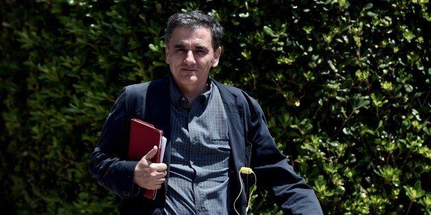 Greek minister of International Economic Relations Euclidis Tsakalotos arrives for a meeting at the Prime minister's office in Athens on June 15, 2015. Athens will patiently wait until its creditors become realistic, Greece's premier said, a day after last-ditch talks between the two sides collapsed and raised fears that Athens would default and exit the eurozone. AFP PHOTO / ARIS MESSINIS (Photo credit should read ARIS MESSINIS/AFP/Getty Images)