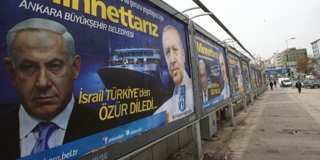 A billboard on a main street by the Ankara municipality to thank Turkish Prime Minister Recep Tayyip Erdogan reads: â We are grateful to you â in Ankara, on March 25, 2013, three days after Israeli Prime Minister Benjamin Netanyahu apologized to Turkey over the death of nine Turkish citizens on board a Gaza-bound flotilla in 2010. AFP PHOTO/ADEM ALTAN (Photo credit should read ADEM ALTAN/AFP/Getty Images)