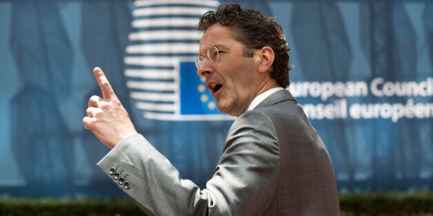 Dutch Finance Minister Jeroen Dijsselbloem gestures as he arrives for a meeting of eurogroup finance ministers in Brussels on Saturday, June 27, 2015. Anxiety over Greece's future swelled on Saturday after Prime Minister Alexis Tsipras' call to have the people vote on a proposed bailout deal. (AP Photo/Thierry Monasse)