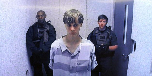 NORTH CHARLESTON, SC - JUNE 19: In this image from the video uplink from the detention center to the courtroom, Dylann Roof appears at Centralized Bond Hearing Court June 19, 2015 in North Charleston, South Carolina. Roof is charged with nine counts of murder and firearms charges in the shooting deaths at Emanuel African Methodist Episcopal Church in Charleston, South Carolina on June 17. (Photo by Grace Beahm-Pool/Getty Images)