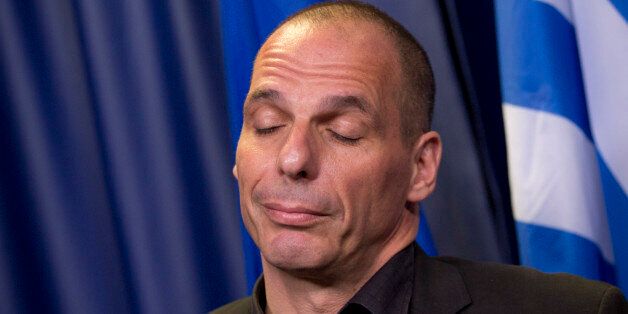Greek Finance Minister Yanis Varoufakis answers questions during a media conference after a meeting of eurogroup finance ministers in Brussels on Saturday, June 27, 2015. Anxiety over Greece's future swelled on Saturday after Prime Minister Alexis Tsipras' call to have the people vote on a proposed bailout deal. (AP Photo/Virginia Mayo)