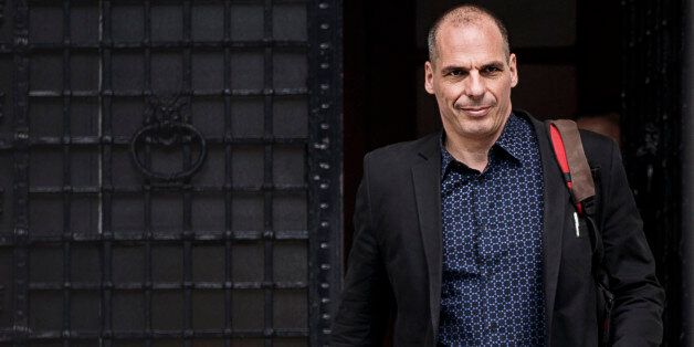 Greek Finance Minister Yanis Varoufakis leaves Maximos Mansion in Athens, Sunday, June 28, 2015. The European Central Bank announced Sunday it was maintaining emergency credit to Greek banks at current levels, keeping a key financial lifeline open the day after the government called a referendum on creditorsâ financial proposals in return for rescue loans, throwing Greeceâs bailout negotiations into turmoil. (AP Photo/Daniel Ochoa de Olza)