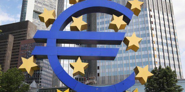 A huge logo of the Euro currence is seen in front of the former headquarters of the European Central Bank (ECB) in Frankfurt am Main, western Germany, on June 29, 2015. After talks between Athens and its creditors broke down, leaving Greece headed for an EU-IMF default and possible exit from the eurozone, the ECB said on June 28, 2015 it would keep open Emergency Liquidity Assistance (ELA) to the debt-hit country's banks.AFP PHOTO / DANIEL ROLAND (Photo credit should read DANIEL ROLAND/AF
