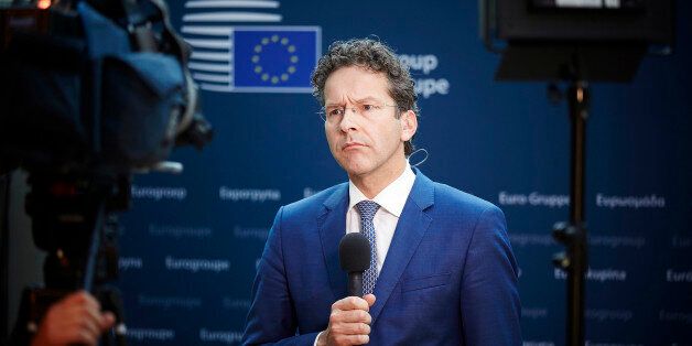 Dutch Finance Minister and chair of the eurogroup Jeroen Dijsselbloem listens to reporters in the Dutch parliament after a teleconference of the 19 eurozone finance ministers in The Hague, Netherlands on Tuesday, June 30, 2015. Dijsselbloem, says