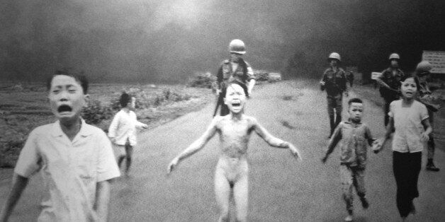 1973 Pulitzer Prize, Spot News Photography, Huynh Cong "Nick" Ãt, Associated PressIt rails from the sky, a thick, caustic gel, sticking to anything it touches â thatched roofs, bare skin â then burning, burning. Napalm: Everyone who is in Vietnam during the war sees it. ForNick Ut, a young Vietnamese photographer working for The Associated Press, the experience is life-altering.Ut has lost his older brother to the war. He himself has been wounded three times. On June 8, 1972, he sets out to cover a battle raging near Trang Bang, 25 miles west of Saigon. "Really heavy fighting." he says. "I shot Vietnamese bombing all morning, the rockets and mortar." Determined to eliminate an entrenched Viet Cong unit. South Vietnamese planes dive low, dropping napalm. But one plane misses. Fire rains down on South Vietnamese soldiers and civilians. Women and children rim screaming. A mother carries a badly burned child. "The one mother with the baby, she died right in my camera. I hear four or five children screaming, Please help! Please help!"As Ut furiously snaps photographs, a young girl runs toward him â arms outstretched, eyes clenched in pain, clothes burned off by napalm. "She said. 'Too hot, please help me.' I say yes,â and take her to the hospital."The girl. Phan Thi Kim Phuc, survives. She grows up, gets married. Through the years, she and Ut stay in touch, brought together by a moment of tragedy.