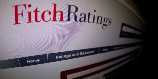 This picture taken on January 17, 2012 in Paris shows a close-up of a page of the Ratings agency Fitch website. AFP PHOTO / JOEL SAGET (Photo credit should read JOEL SAGET/AFP/Getty Images)