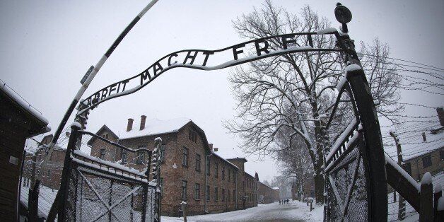 The entrance to the former Nazi concentration camp Auschwitz-Birkenau with the lettering 'Arbeit macht frei' ('Work makes you free') is pictured in Oswiecim, Poland on January 25, 2015, days before the 70th anniversary of the liberation of the camp by Russian forces. AFP PHOTO / JOEL SAGET (Photo credit should read JOEL SAGET/AFP/Getty Images)