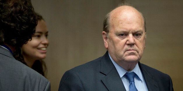 Irish Finance Minister Michael Noonan, right, arrives for a round table meeting of eurogroup finance ministers at the EU LEX building in Brussels on Wednesday, June 24, 2015. Eurozone finance ministers meet Wednesday to discuss the Greek bailout. (AP Photo/Virginia Mayo)