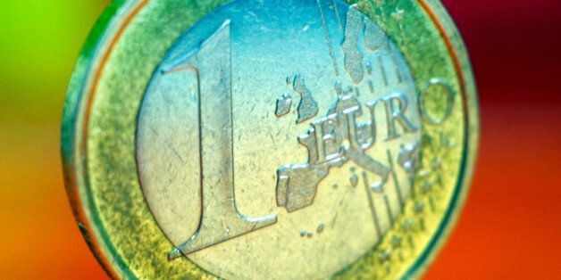 A euro-coin is pictured in Frankfurt, Germany, Monday, July 15, 2002. The euro hit parity with the U.S. dollar on Monday, rising to an exchange rate of dollars 1.0032 - its highest value since February 2000 and a psychological boost for the three-year-old shared European currency. (AP Photo/Michael Probst)